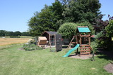 Ferienwohnung in Rettin - Ferienhof Hansen Strandhafer - Gartenhäuschen mit Strandkorb und Spielplatz